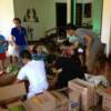 Sorting relief goods by Mediano family and friends. Adele Roa