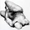 Reclining male nude -- charcoal