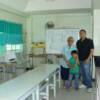 Sr. Marcia, John Francis and Justin in the computer room.